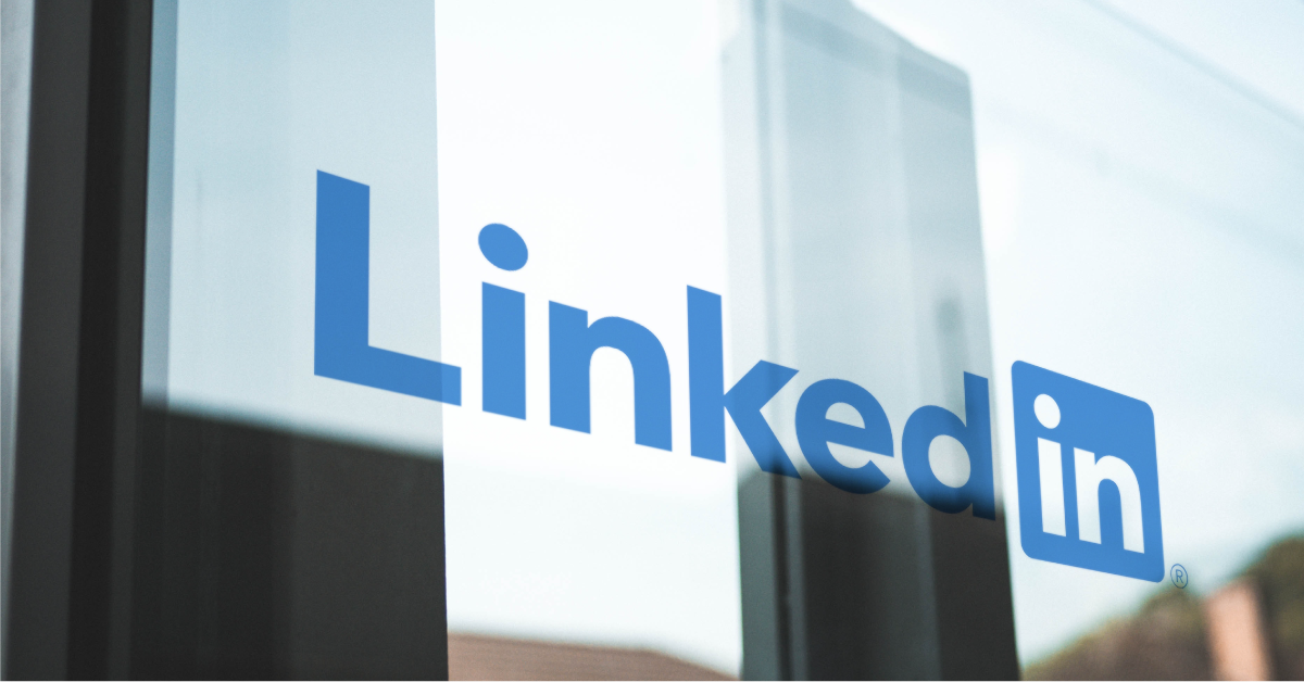 LinkedIn logo on a glass doorway. 